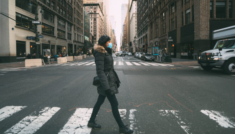 Person crossing street - How Unintended Consequences Launched the COVID Psychedelic Revolution