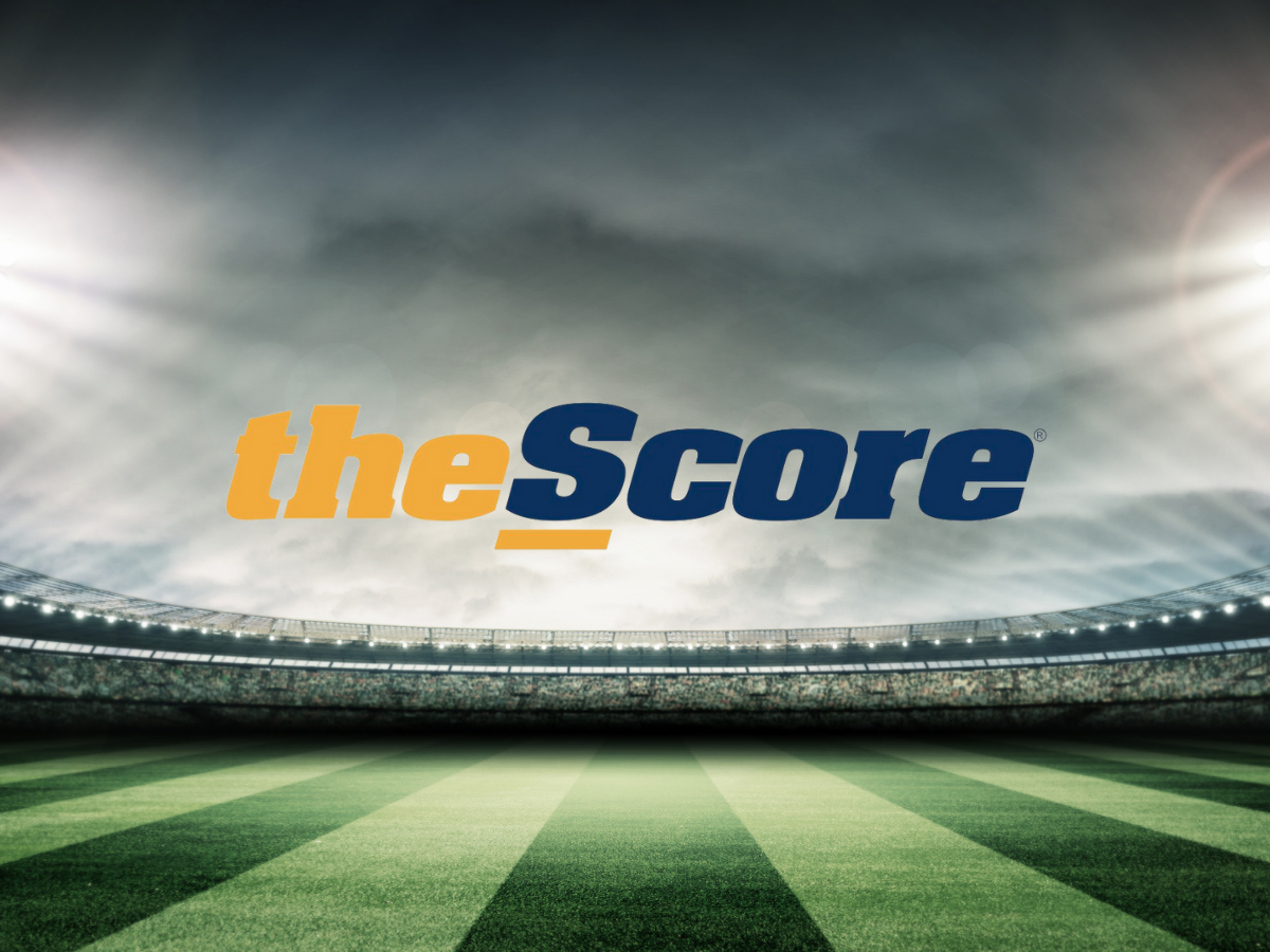 theScore logo over lit field at night